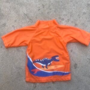 UV Skinz Orange Dinosuar Print Short Sleeve Water Rashguard Size 4T